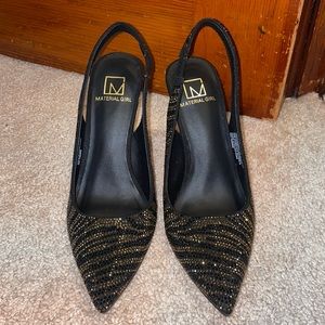 Black and gold heels